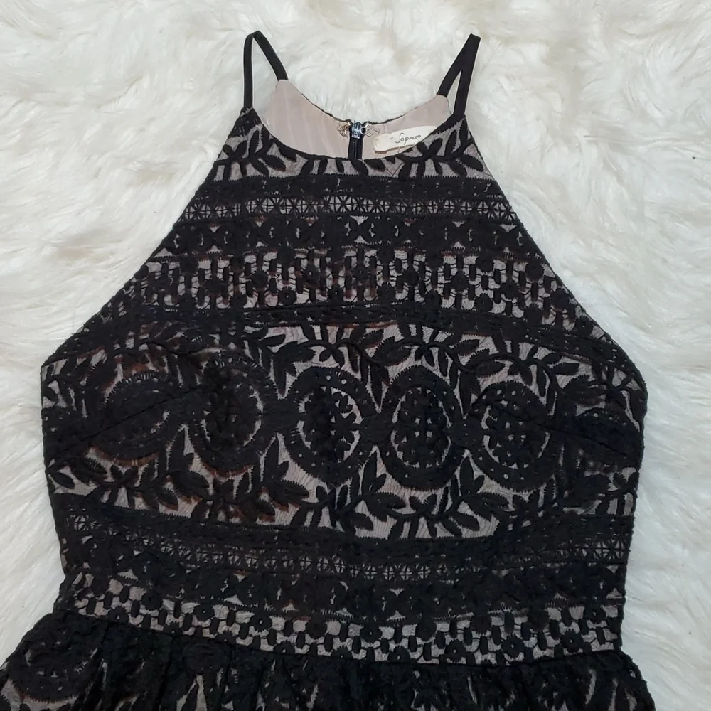 Soprano black with cream underlayer size small in like NEW condition